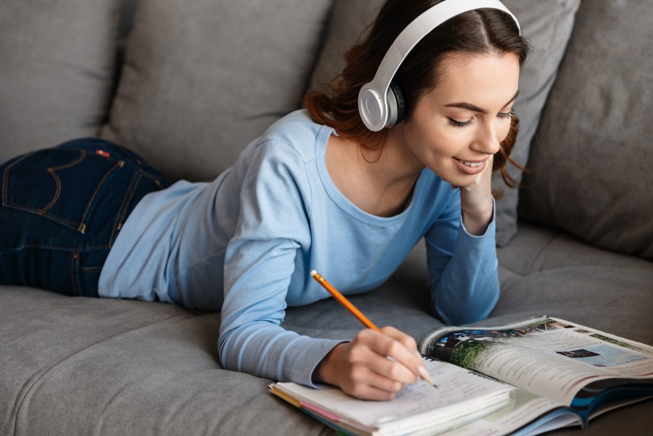 Portrait of an attractive young woman in headphones